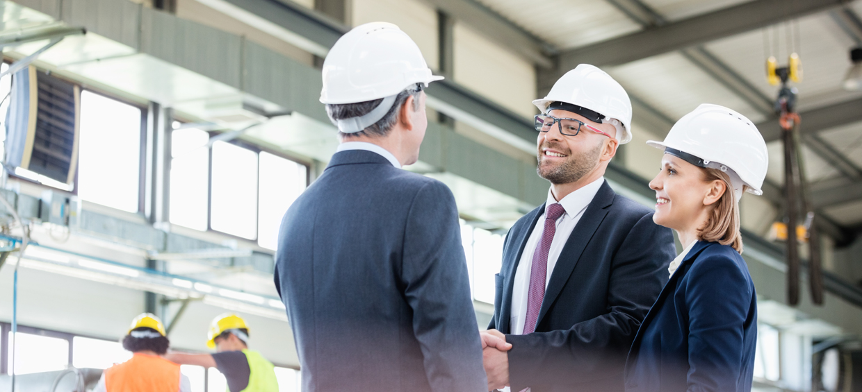Manufacturing executives in plant - Sheer Velocity Industrial Recruiter